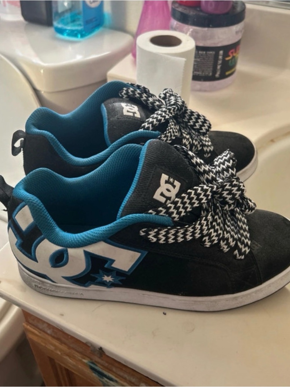 DC Low-Top Black and Teal Skate Sneakers